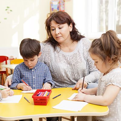Angelica with children at Apple Valley Childcare & Preschool